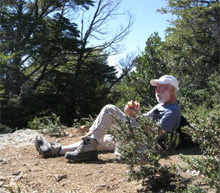 On a mountain top, overlooking the lakes of Bariloche, Argentina, California Native founder Lee Klein enjoys the view and another ham and cheese sandwich.